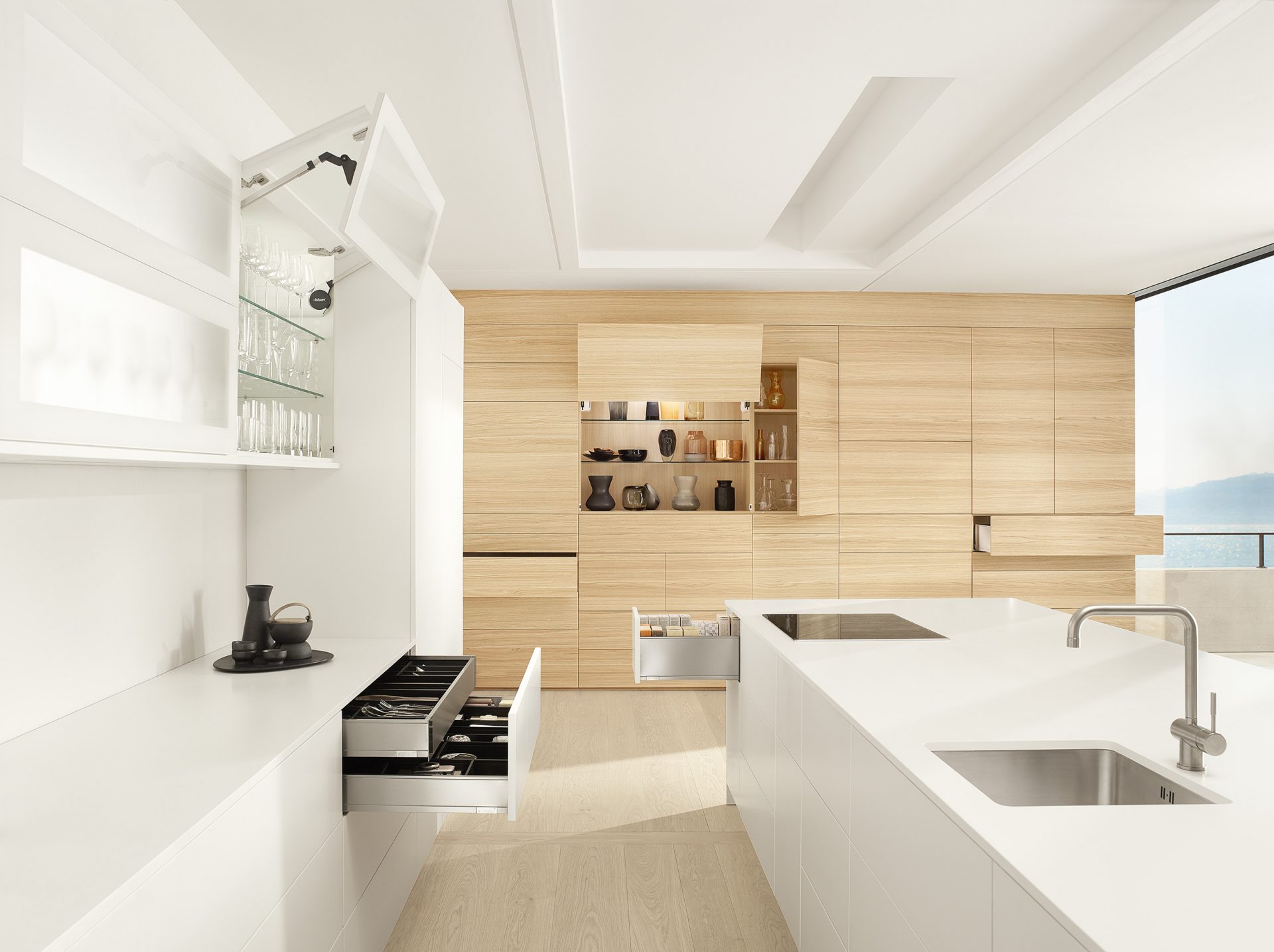 Blum combines design & function to meet the minimalist trend towards handleless furniture