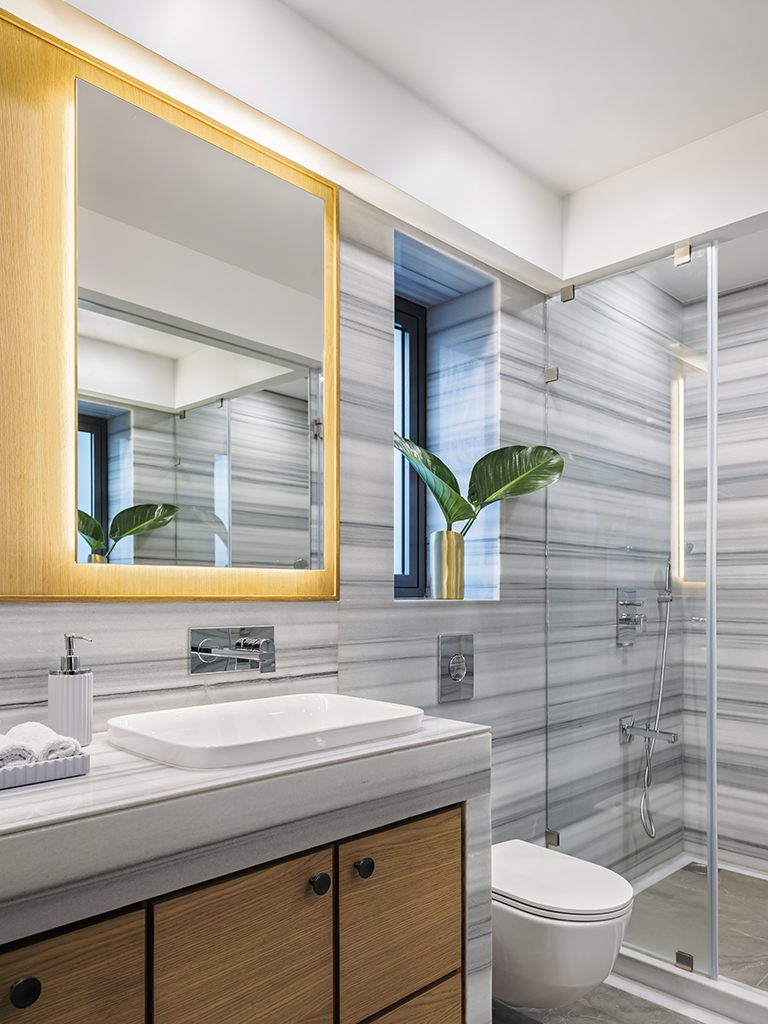 How can marble be incorporated as a timeless décor element in